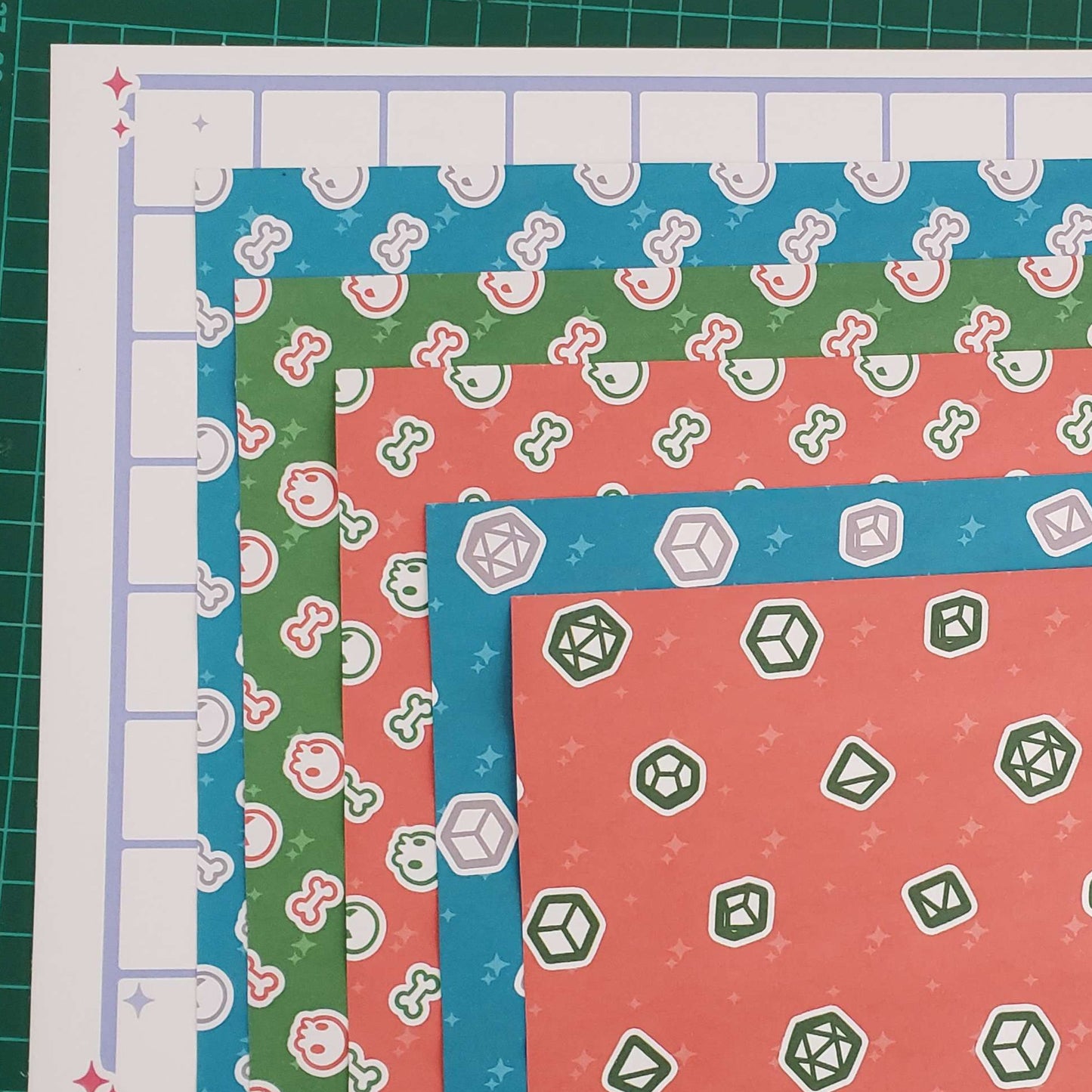 Ttrpg dice and skulls + bones wrapping paper